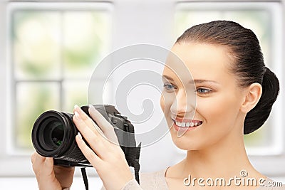 Teenage girl with digital camera Stock Photo