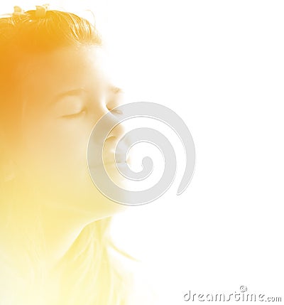 Teenage girl enjoying the morning sunshine Stock Photo