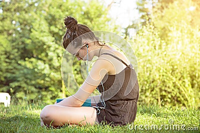 Teenage girl hears music Stock Photo