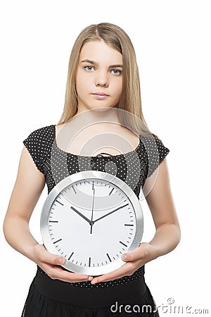 Teenage Girl Holding Office Clock. Time Concept Stock Photo