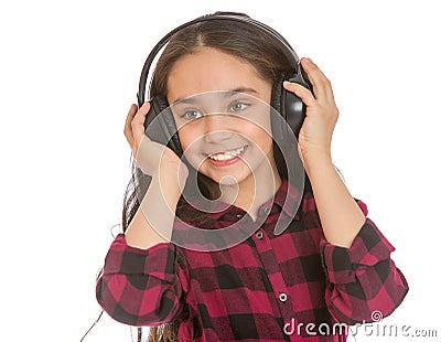 Teenage girl listening to big black headphones Stock Photo