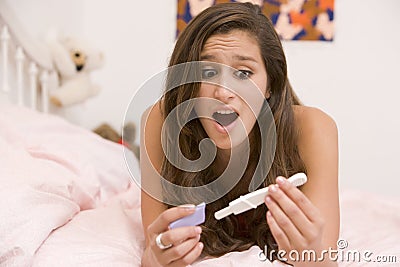 Teenage Girl Lying On Her Bed Stock Photo