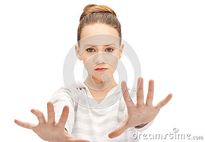 Teenage girl making stop gesture Stock Photo