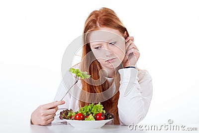 Teenage girl with no appetite Stock Photo