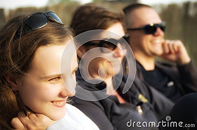 Teenage girl with parents Stock Photo