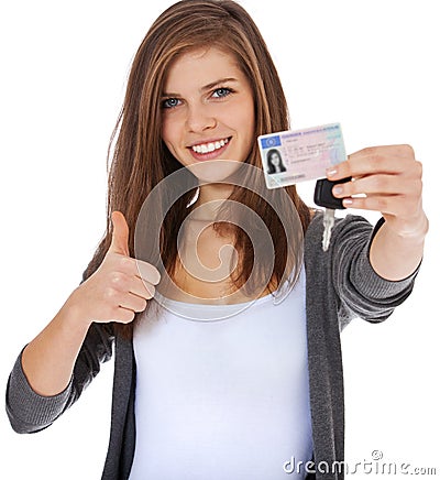 Teenage girl proudly showing her driver licence Stock Photo