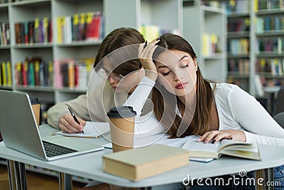 teenage girl reading book near friend Stock Photo