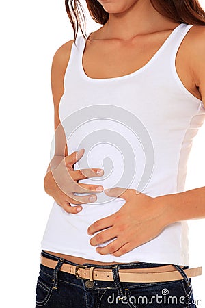 Teenage girl suffers from stomach cramps Stock Photo