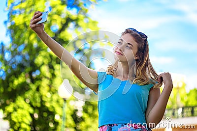 Teenage girl taking selfie Stock Photo