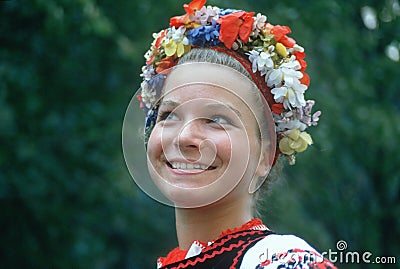 A teenage girl in traditional Slavic costume Editorial Stock Photo