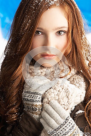 Teenage Girl Wearing Warm Winter Clothes In Studio Stock Photo