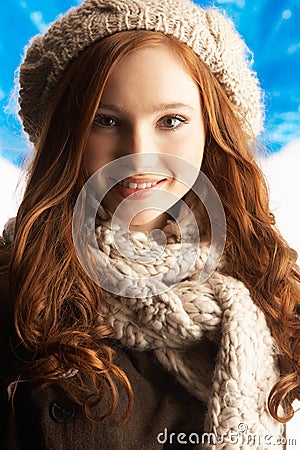 Teenage Girl Wearing Winter Clothes In Studio Stock Photo