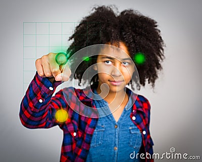 Teenage Girl With Whacky Afro Hair Playing A Virtual Game Stock Photo