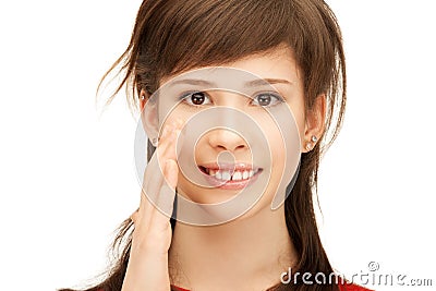 Teenage girl whispering gossip Stock Photo