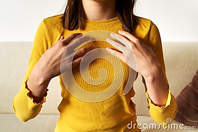 Teenager practicing EFT tapping - emotional freedom technique Stock Photo