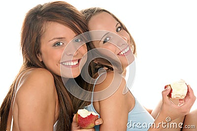 Teenage girls with apples Stock Photo