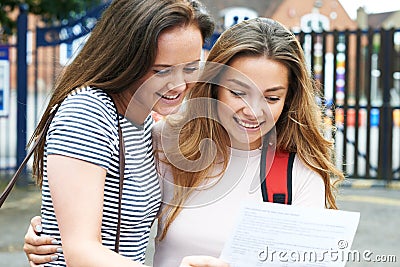 Teenage Girls Celebrating Exam Results Stock Photo