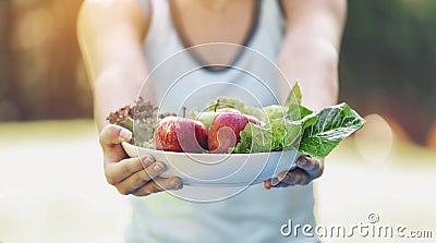 Teenage girls holding a plate with fruits, vegetables, eat healthy Stock Photo