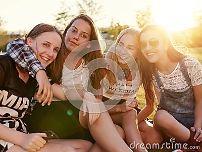 Teenage girls hugging Stock Photo