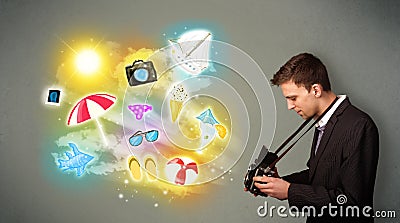 Teenage photographer making photos of holiday painted icons Stock Photo