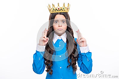 Teenage selfish girl celebrates success victory. Teen child in queen crown isolated on white background. Princess girl Stock Photo
