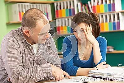 Teenage Student In Classroom Stock Photo