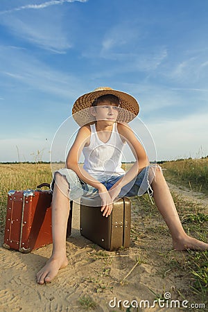 Teenage traveler hoping and waiting Stock Photo