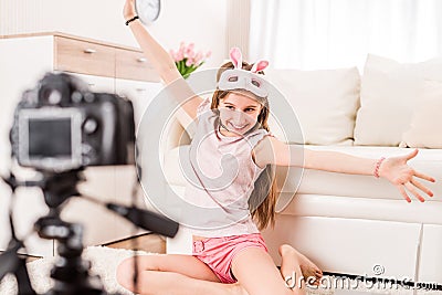 Teenaged girl is posing on camera Stock Photo
