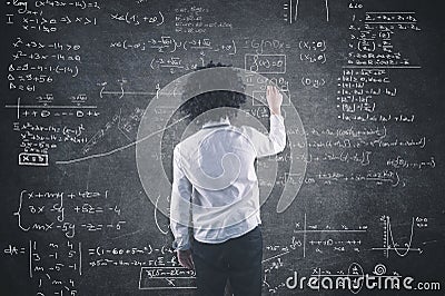 Teenager and blackboard Stock Photo