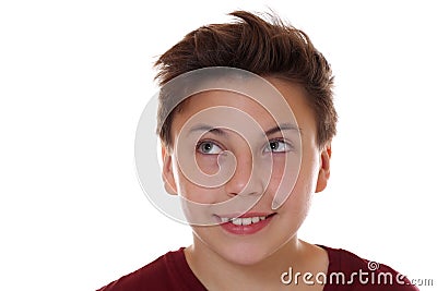 Teenager child boy smiling and looking up Stock Photo