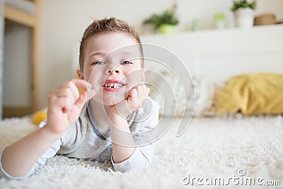 Teenager child with a tooth dropped out Stock Photo