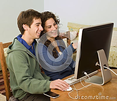 Teenager couple computer Stock Photo