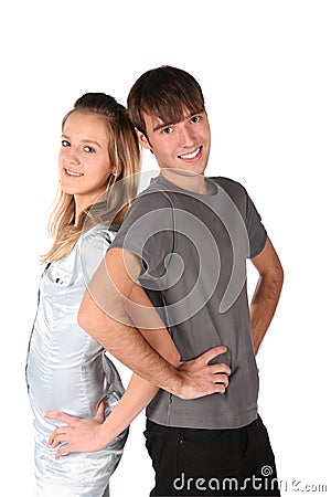 Teenager couple stand back to back Stock Photo