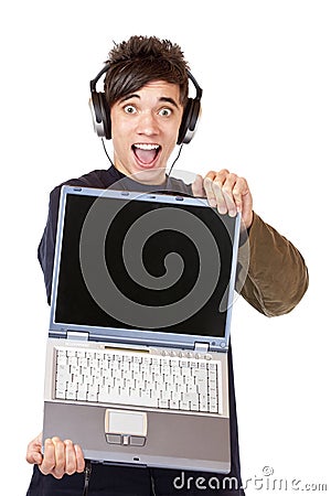 Teenager with earphones shows computer display Stock Photo