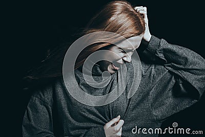 Teenager feeling a heartache Stock Photo