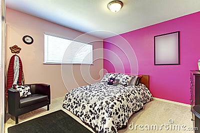 Teenager girl bedroom with bright pink wall and simple interior Stock Photo