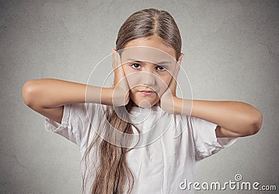 Teenager girl covering ears with hands Stock Photo