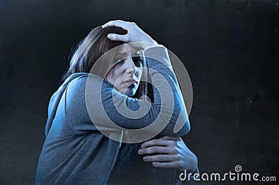 Teenager girl feeling lonely scared sad and desperate suffering Stock Photo