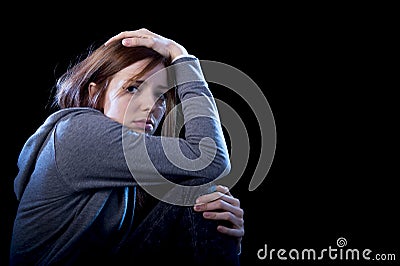 Teenager girl feeling lonely scared sad and desperate suffering Stock Photo