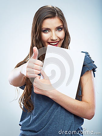 Teenager girl hold white blank paper. Young smilin Stock Photo