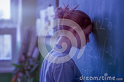 Teenager girl in math class overwhelmed by the math formula. Pressure, Education concept. Stock Photo