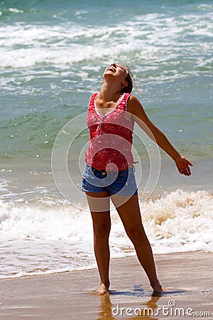 Teenager Girl on a Seashore Stock Photo
