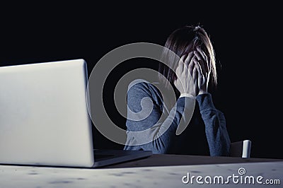 Teenager girl suffering cyberbullying scared and depressed exposed to cyber bullying and internet harassment Stock Photo