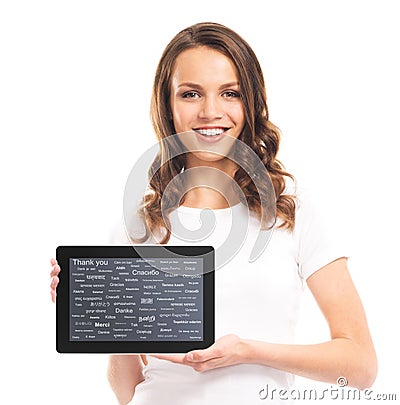 Teenager girl with a tablet computer. Different world languages Stock Photo