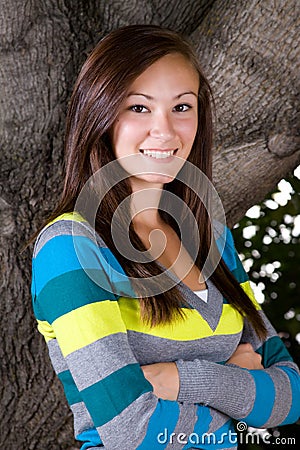 Teenager with her arms crossed Stock Photo