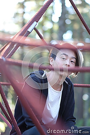 Teenager in the park Stock Photo