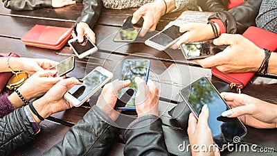 Teenager people having fun using smartphones - Millenial community sharing content on social media network with mobile smart Stock Photo