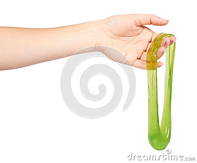 teenager playing green slime with hand, transparent toy Stock Photo