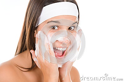 Teenager problem skin care - woman wash face Stock Photo