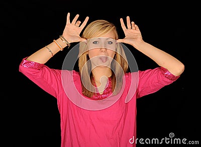 Teenager pulling funny face Stock Photo